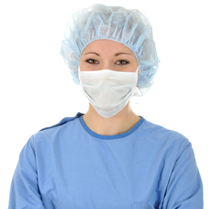 Doctor wearing surgical cap, mask, and gown